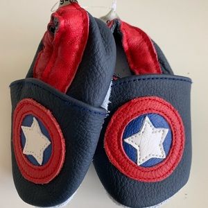 0-6 month moccs. never worn.